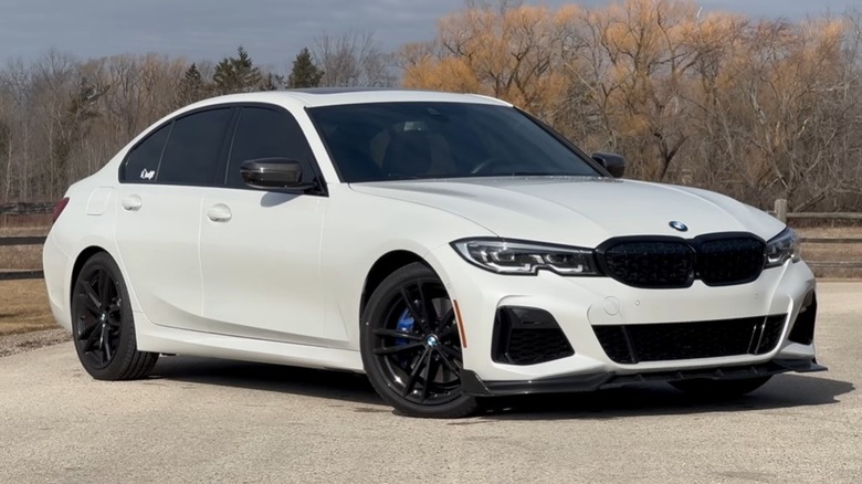 The front-right three quarter image of a white 2021 BMW M340i