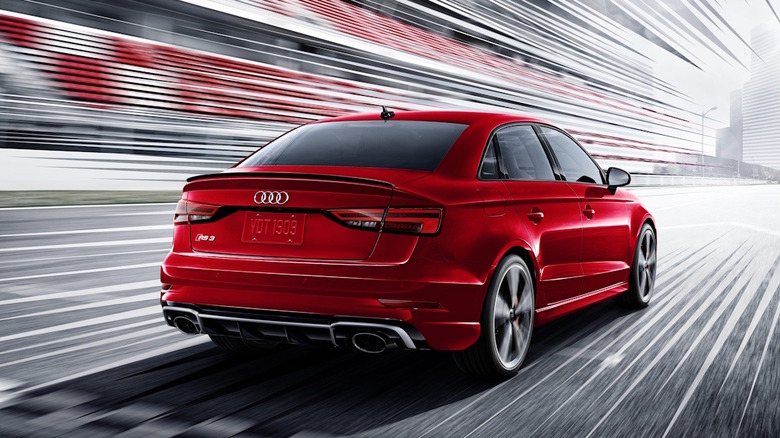 A rear view of a red 2020 Audi RS 3.
