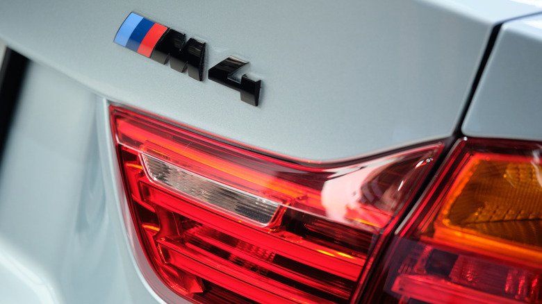 A close up of BMW M4's logo.