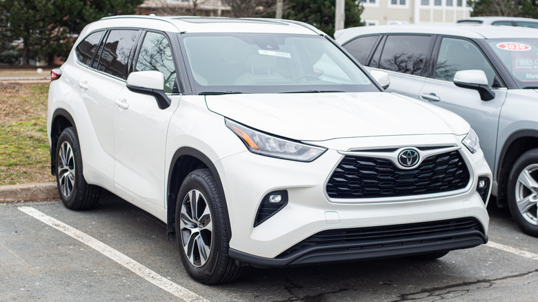 White Toyota Highlander parked