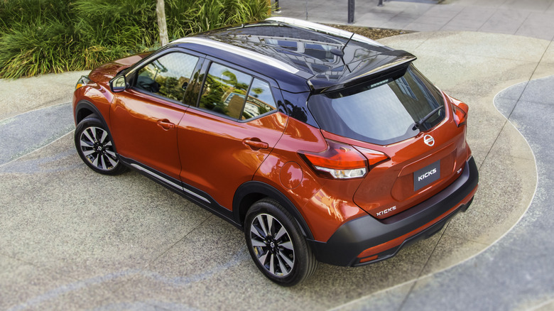 First-gen Nissan Kicks parked on a paved surface with a building in the background