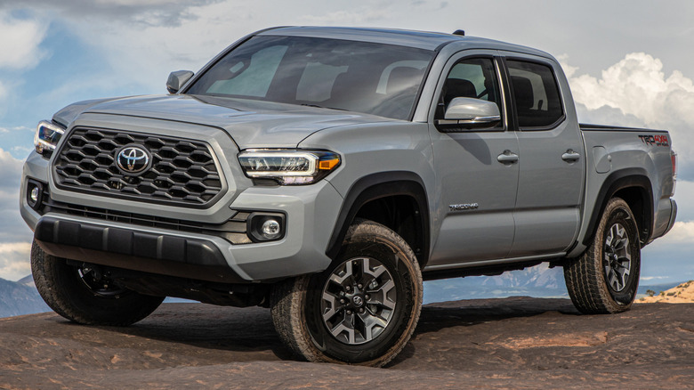 A gray 2020 Toyota Tacoma TRD Off-Road parked on rocky off-road terrain