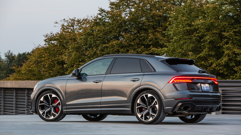 A rear left 3/4 shot of a 2020 Audi RS Q8 in Daytona Gray