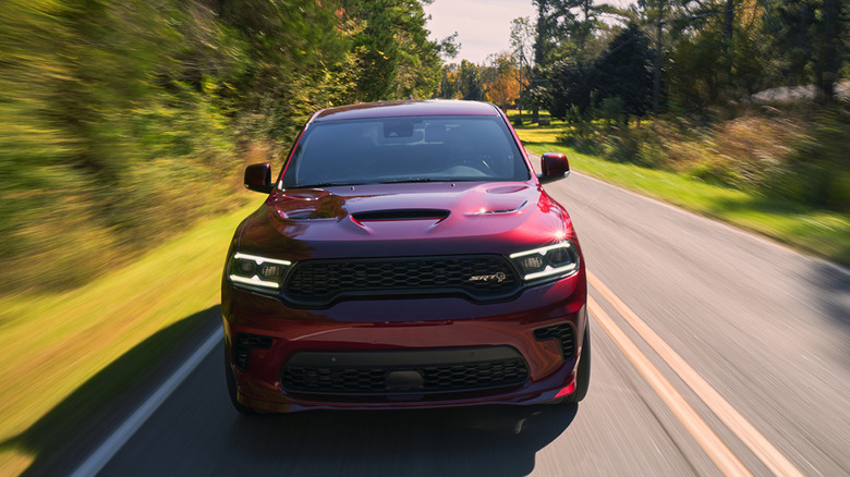 A 2021 Dodge Durango SRT Hellcat driving down a road