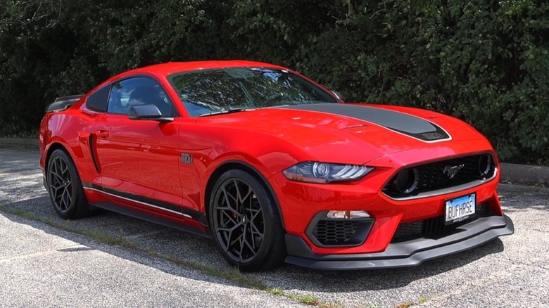 Front 3/4 static shot of a red 2021 Ford Mustang Mach 1.