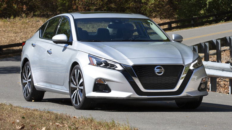 Front-right three quarter view of a silver 2021 Nissan Altima on the road
