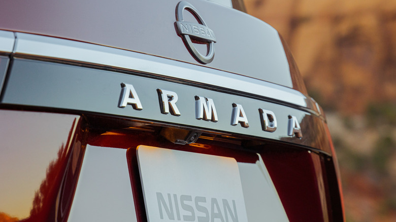 The tailgate of a red 2021 Nissan Armada.