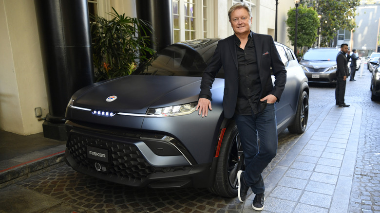 Henrik Fisker standing in front of his Ocean electric SUV