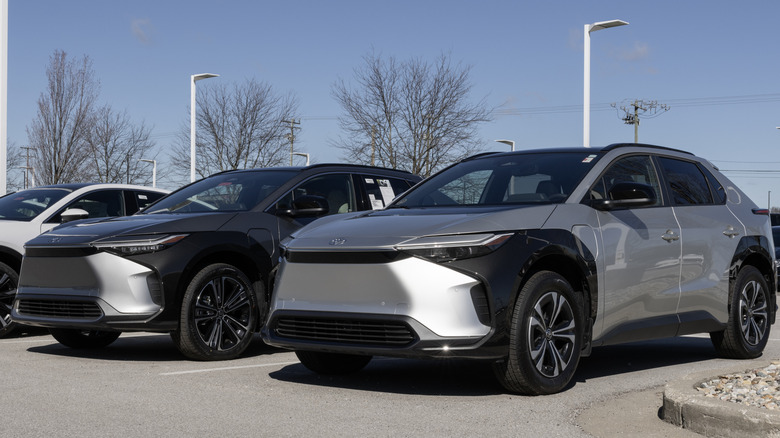 Multiple Toyota bZ4Xs parked in a dealership lot