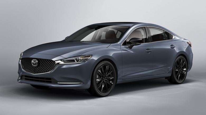 Studio portrait of a 2021 Mazda 6 Carbon Edition against a contrasting white backdrop