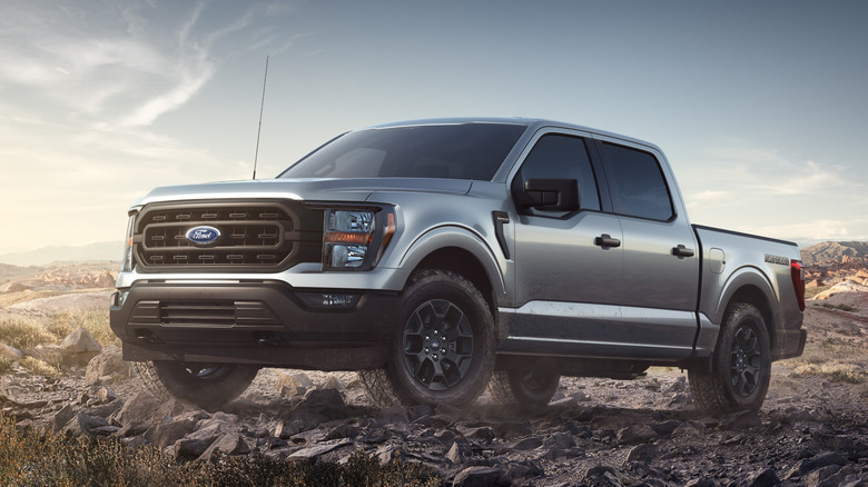 Front-quarter shot of a 2023 Ford F-150 Rattler off-roading