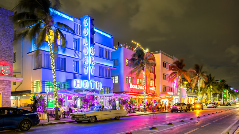 Miami beach glowing with neon signs on a cloudy night