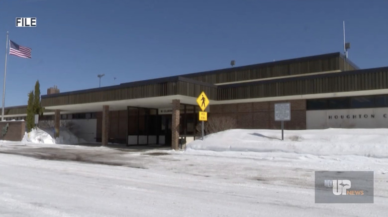 Houghton County Memorial Airport facade on a snowy clear day