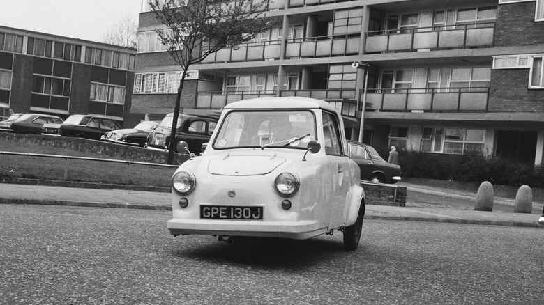 Front shot of an Invacar driving, black and white