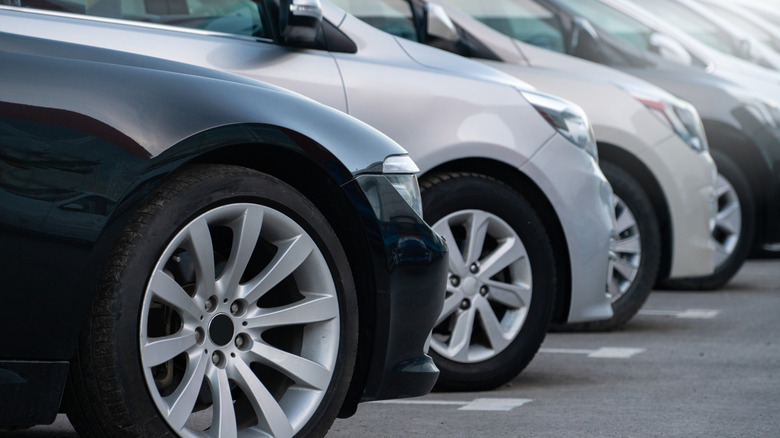 Cars parked in a row at a dealership
