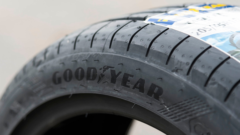 A closer view at the Goodyear branding on the sidewall of a new tire