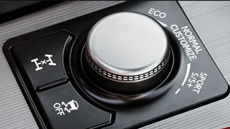 A lexus drive mode selector wheel