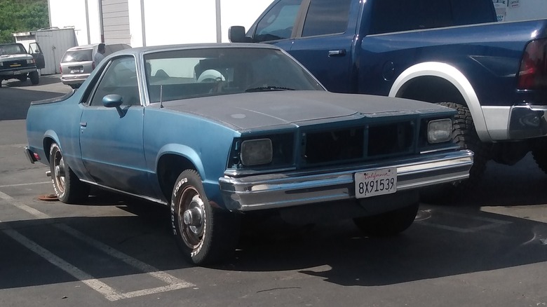 A front view of a dust-covered blue 1979 Chevrolet El Camino