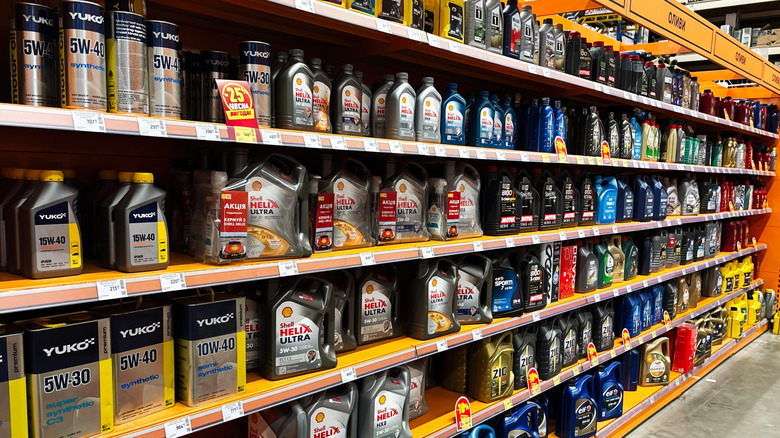 Fresh bottles of motor oil on store shelves