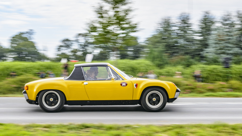 Porsche 914 driving on the road