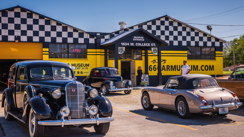 Vintage cars park outside the Route 66 Car Museum in Springfield, Missouri