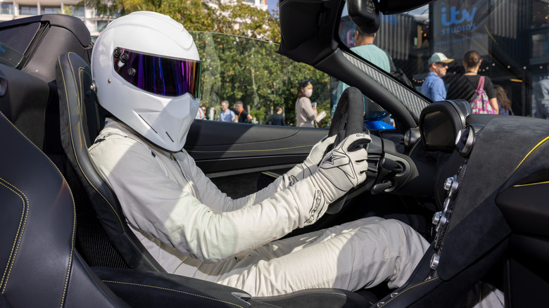 The Stig attends the "The Stig/Top Gear W/Super Car" photocall as part of MIPCOM 2022 on October 17, 2022 in Cannes, France.