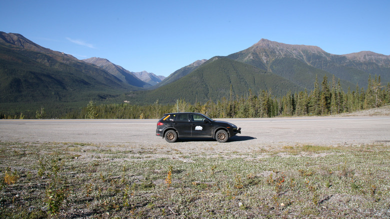 Porsche Cayenne Diesel parked near a scenic overlook in Northern Canada