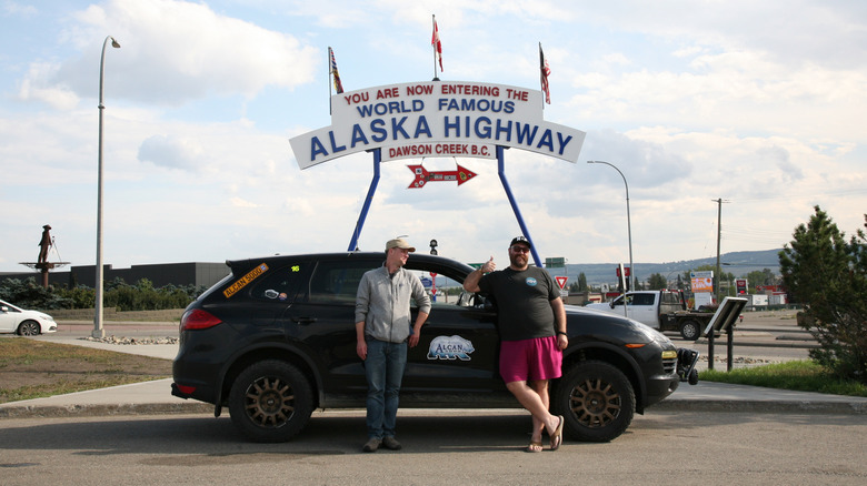 Alex and I with the Porsche Cayenne Diesel on the Alaska Highway