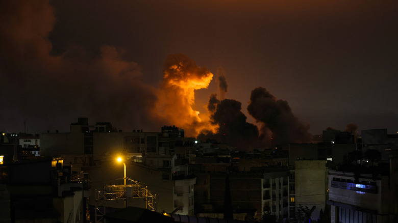 Smoke rises over Tehran