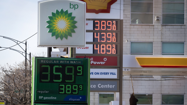 Signs display prices for gasoline at stations on March 02, 2026 in Chicago, Illinois.
