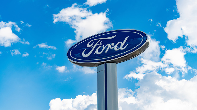 Ford logo against blue cloudy sky