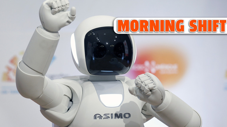 ST QUENTIN, FRANCE - NOVEMBER 25: Honda Motors demonstrates its ASIMO robot during the 'Robonumerique' exhibition on November, 25, 2014 in St Quentin, France. ASIMO (Advanced Step in Innovative Mobility) is a humanoid robot developed by Honda which measures 1.30 meters per 40 kg. Considered the most powerful humanoid robot in the world, the all-new ASIMO was introduced for the first time in Europe in Brussels. The Japanese group has considerable technological advances: intelligence, dexterity and motor skills. (Photo by Chesnot/Getty Images)