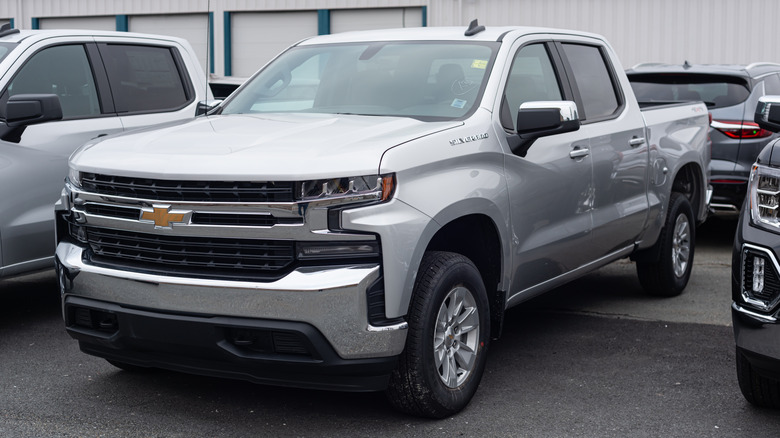 A 2021 Chevrolet Silverado 1500 Pickup Truck at a dealership.