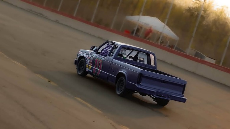 Purple race truck on track