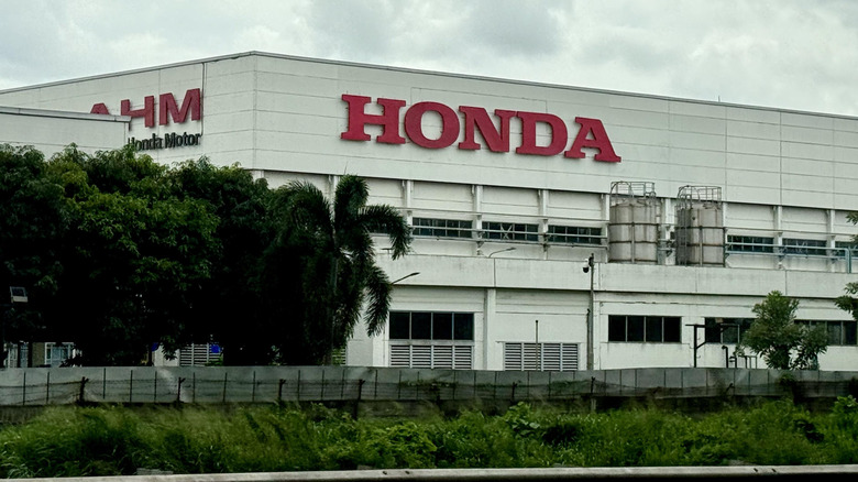 Cikarang, Indonesia - Jan 27, 2026: A facade view of the factory building of Astra Honda Motor.