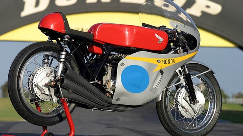 A George Beale replica RC174, parked on a racetrack.