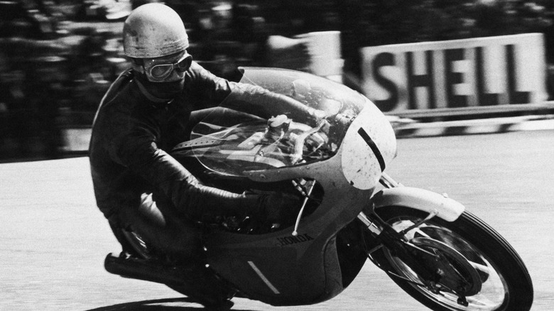 Jim Redman riding a Honda to victory in 1964 at the Isle of Man TT.