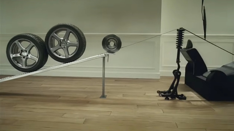 A still image from Honda's "The Cog" car commercial including wheels going uphill