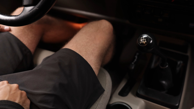 Interior of TJ Wrangler showing manual transmission shifter