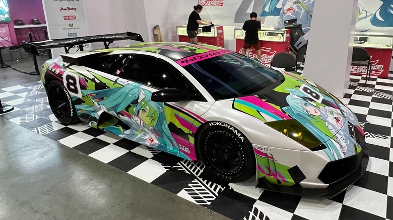 A Goodsmile Racing Lamborghini at an anime expo