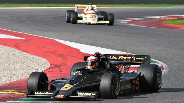 A Lotus 78 driving on track
