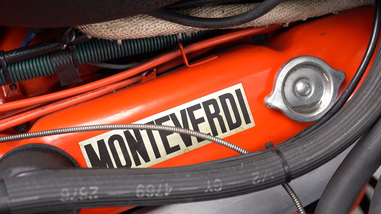 An orange Monteverdi Safari V8 valve cover