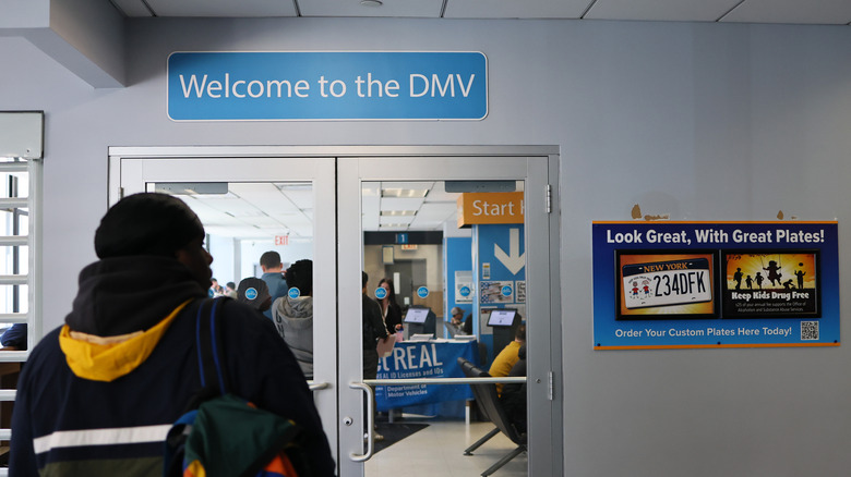 A person prepares to enter a New York State DMV on April 28, 2025 in New York City.