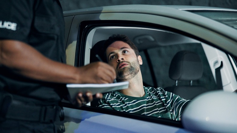 Driver is stopped by a policeman