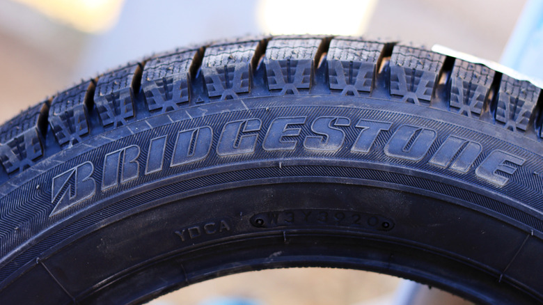 A close-up of a Bridgestone tire sidewall.
