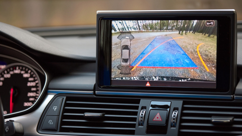 A car's backup camera shown up close.
