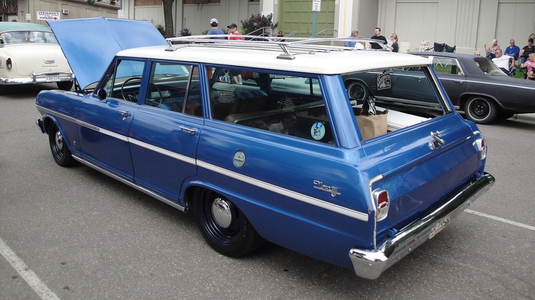 Rear 3/4 blue 1963 Chevrolet Chevy II Nova 400 station wagon with white roof