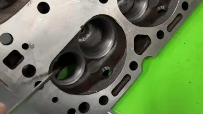 Looking inside the double hump head combustion chamber.