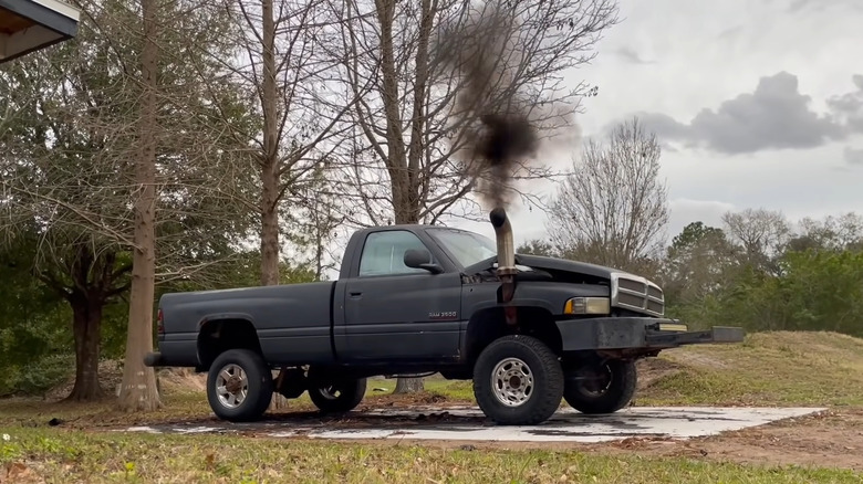 A P-Pumped Cummins Dodge Ram truck parked in a farm