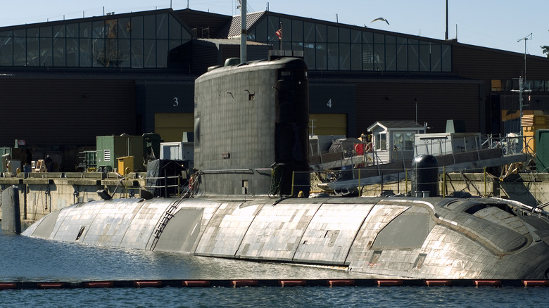 The H.M.C.S. Victoria, one of Canada's recently acquired diesel and electric submarines, tied up at the dock at the Canadian Navy base Esquimalt